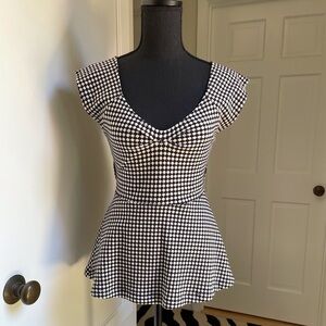 Anthropologie cotton knit top w/peplum & crisscross open back detail. Vietnam